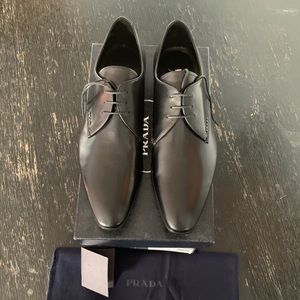 Men’s Prada lace-up leather dress shoes
